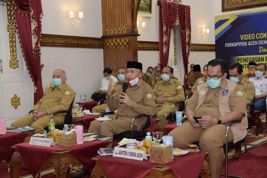 FOTO/ HUMAS PEMERINTAH ACEH Plt Gubernur menginstruksikan seluruh bupati dan wali kota untuk menyampaikan imbauan mematuhi Protokol Kesehatan Covid-19, dalam rapat online melalui video converence antara Forkopimda Aceh dengan Forkopimda Kabupaten/Kota, Selasa (9/6/2020).