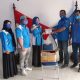 FOTO/ HUMAS KNPI ACEH Wakil Ketua DPD KNPI Aceh H Tarmizi SE menyerahkan masker dan hand sanitizer yang diterima Sekretaris KNPI Bireuen Syarifah Reynisa, Amd.Rad di Kantor KNPI Bireuen, Senin (29/6/2020).
