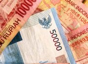Kasus Covid-19 Meningkat, Rupiah Melemah ke Rp14.460 per USD