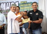 Bupati Aceh Besar Serahkan Bonus untuk Atlet PON XX dan Juara STQH Nasional 