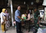 Dandim Pidie Serah Bantuan Sembako Kepada Janda