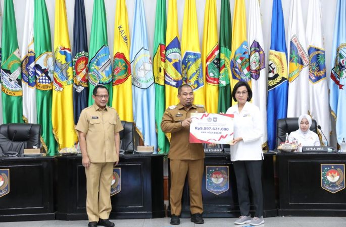 Terima Penghargaan Insentif Fiskal Dari Mendagri dan Menkeu, Iswanto Bertekad Kendalikan Inflasi Secara Bekelanjutan di Aceh Besar