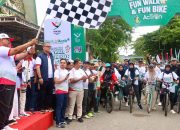 Meriahkan PON XXI, Pj Gubernur Lepas Peserta Jalan dan Sepeda Santai