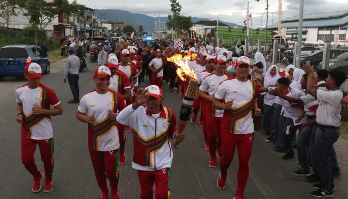Di Aceh Tengah Tim Kirab Api PON XXI Disambut Meriah